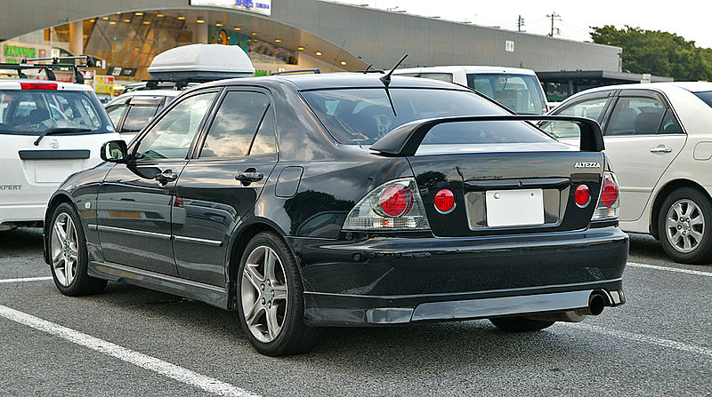 TRD Style Rear Bumper Lip Diffuser – 01-05 Lexus IS300 Sedan, Unpainted Black PU